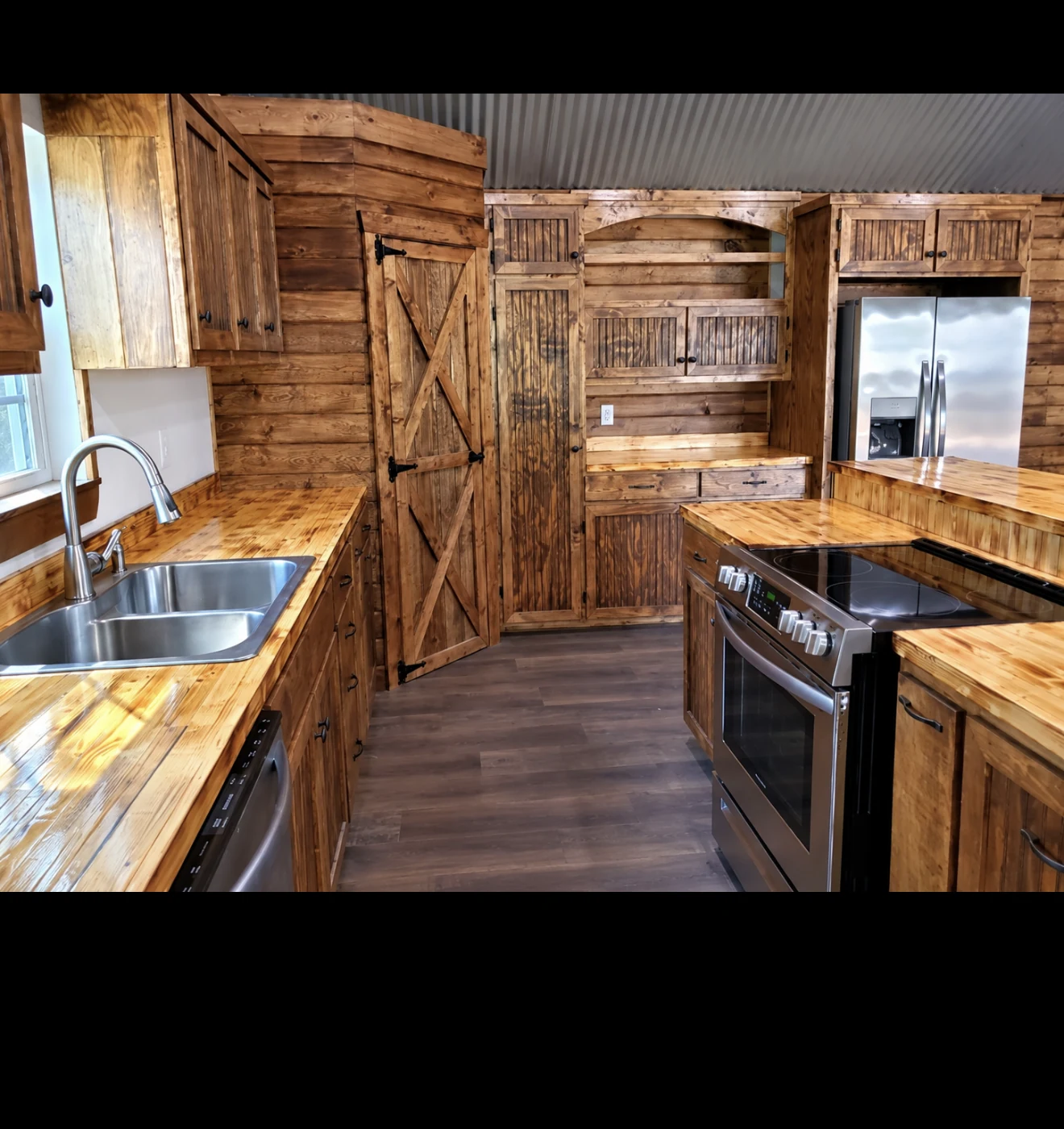 Custom wood kitchen in a turnkey Davco Designz home